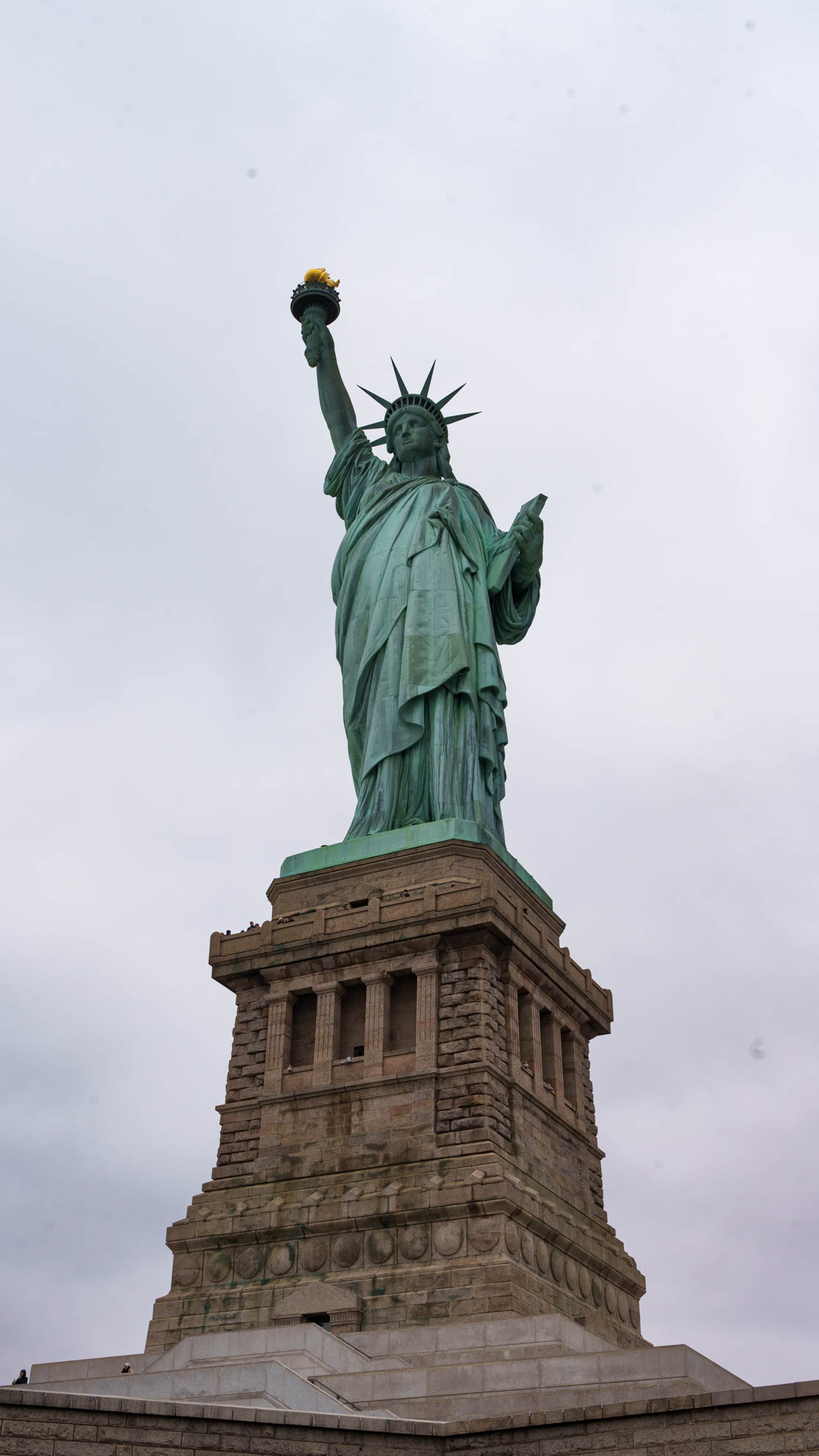 Statue of Liberty against an overcast sky